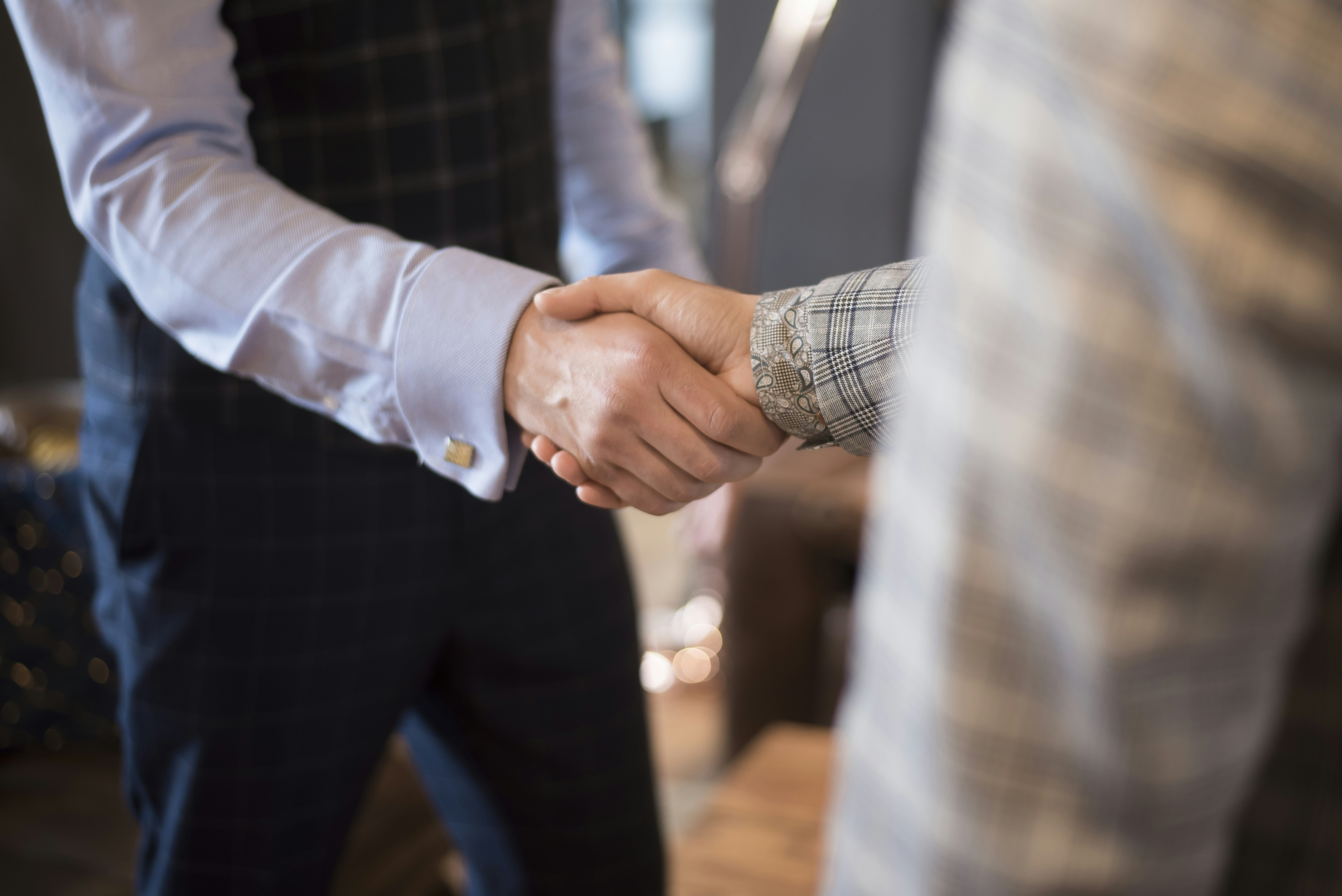 Corporate meeting and business handshake